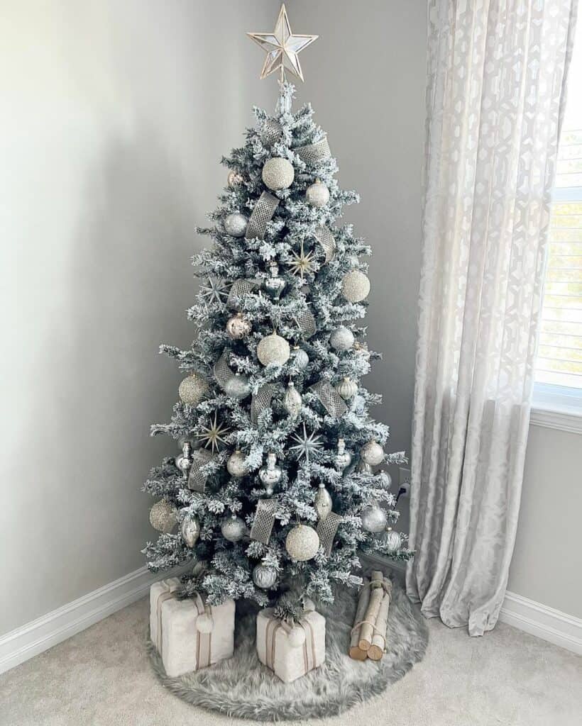 Frosted Christmas Tree with Metallic Silver Decorations