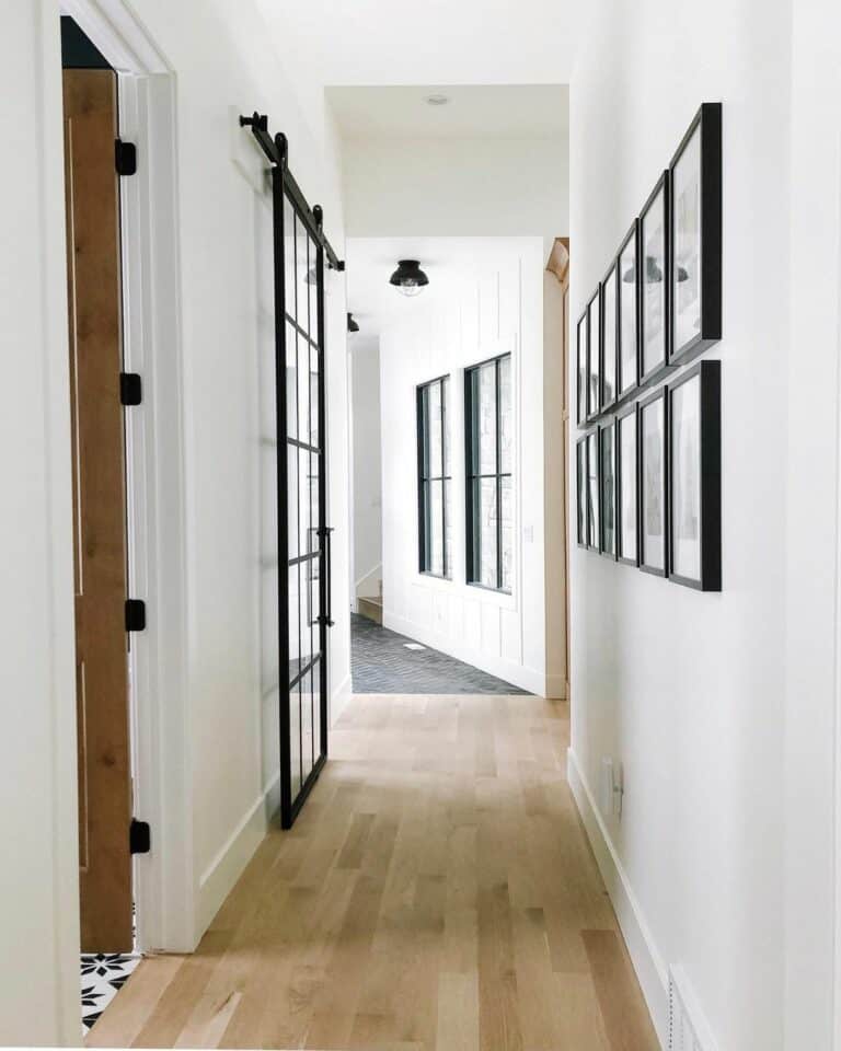 Gallery Wall Hallway with Black Framed Windows