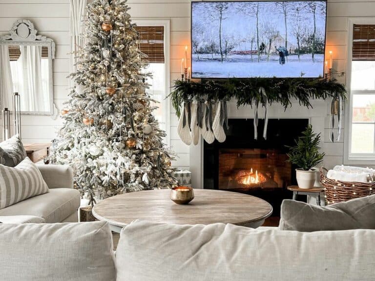 Garland Decorated Mantle on White Shiplap Wall