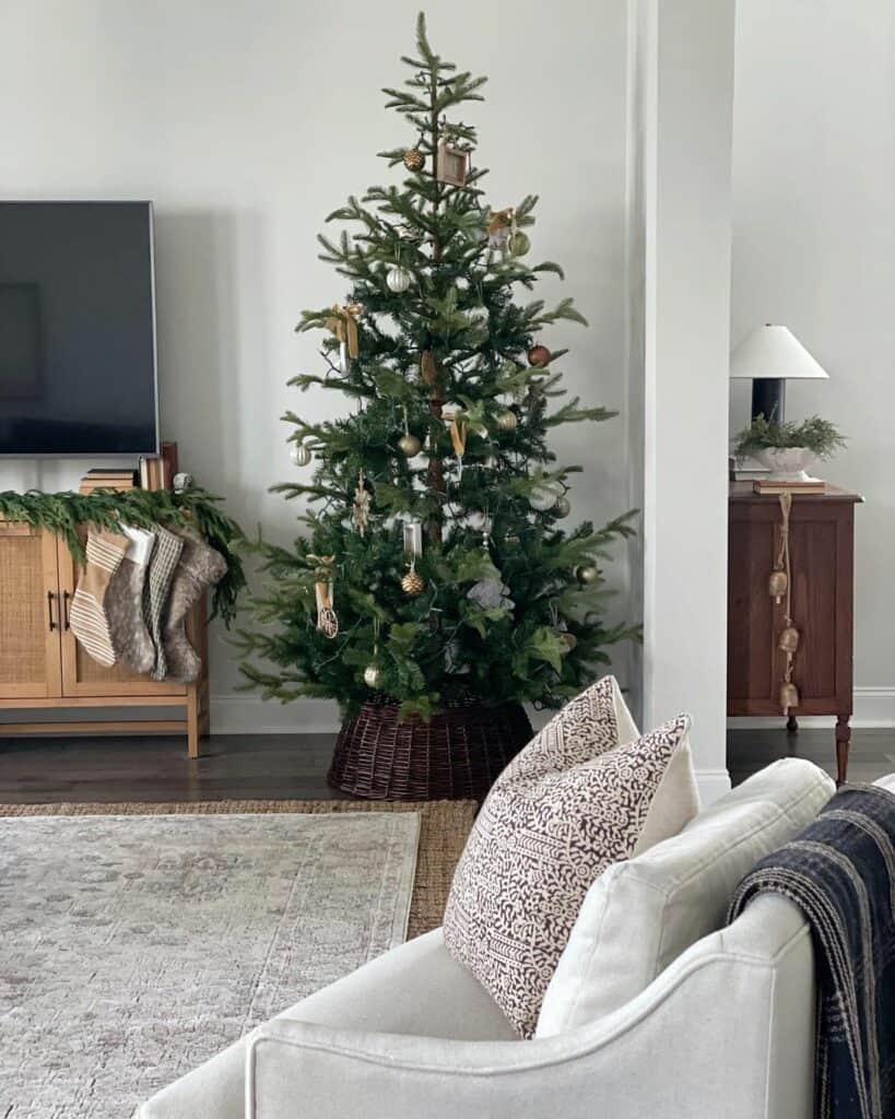 Garland Next to a Tree in a Dark Woven Tree Collar