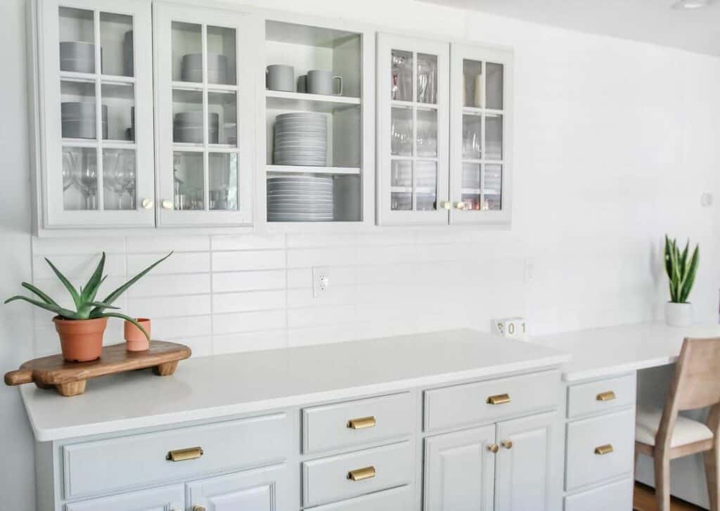 Gold Handles on Light Grey Lower Cabinets