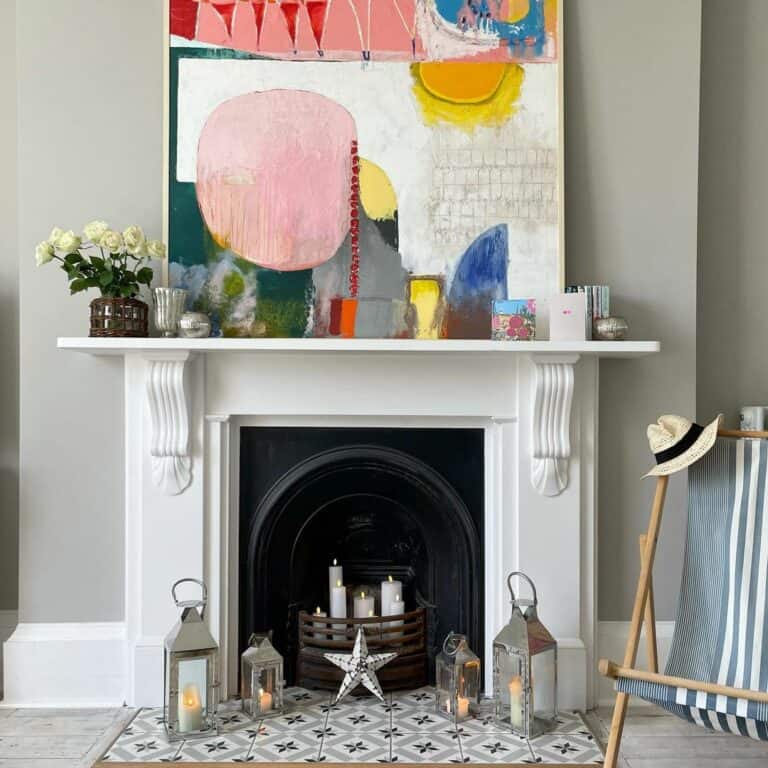 Gray Candles and Lanterns Around Fireplace