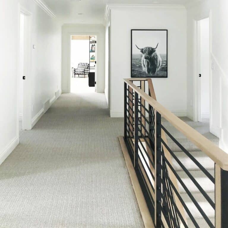 Gray Carpeted Hallway with Recessed Lighting