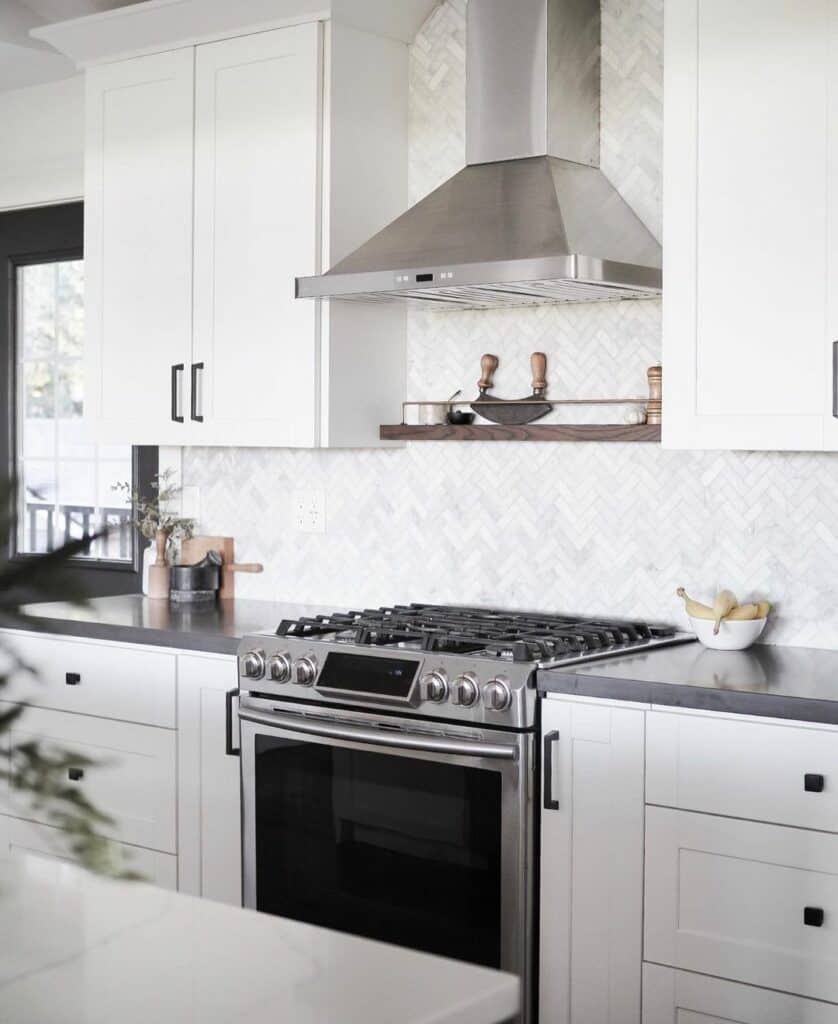 Gray Countertops Complement Modern White Cabinets