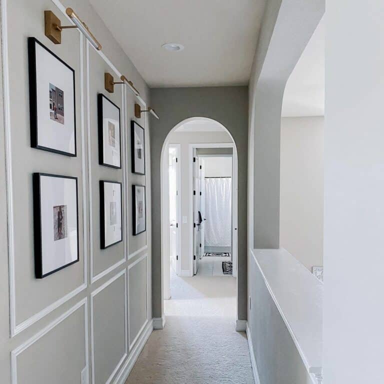 Gray Hallway with Sconces and Recessed Hallway Lighting