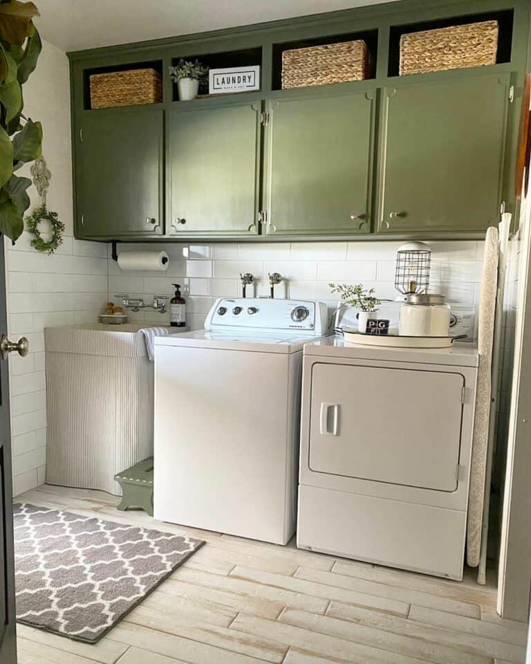 Green Cabinets and a Wood Tile Floor