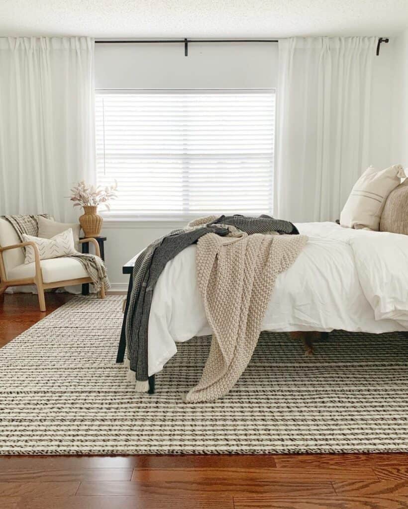 Grey Blanket on a White Comforter