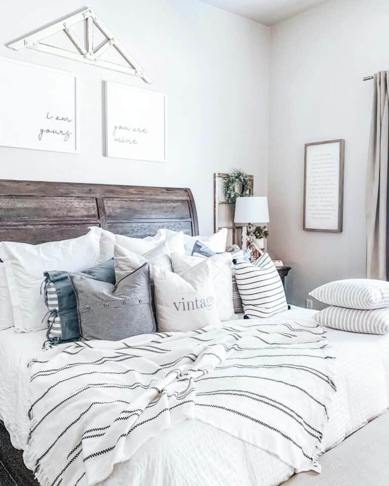 Grey and White Pillows on a Sleigh Bed