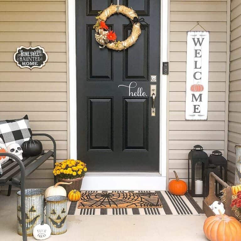 Halloween-Inspired Front Porch with Black Pumpkin Décor