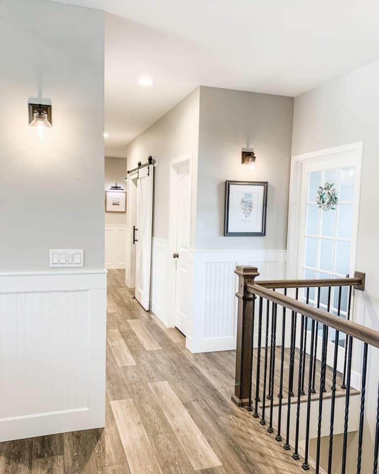 Hallway with Recessed Lighting and Sconces