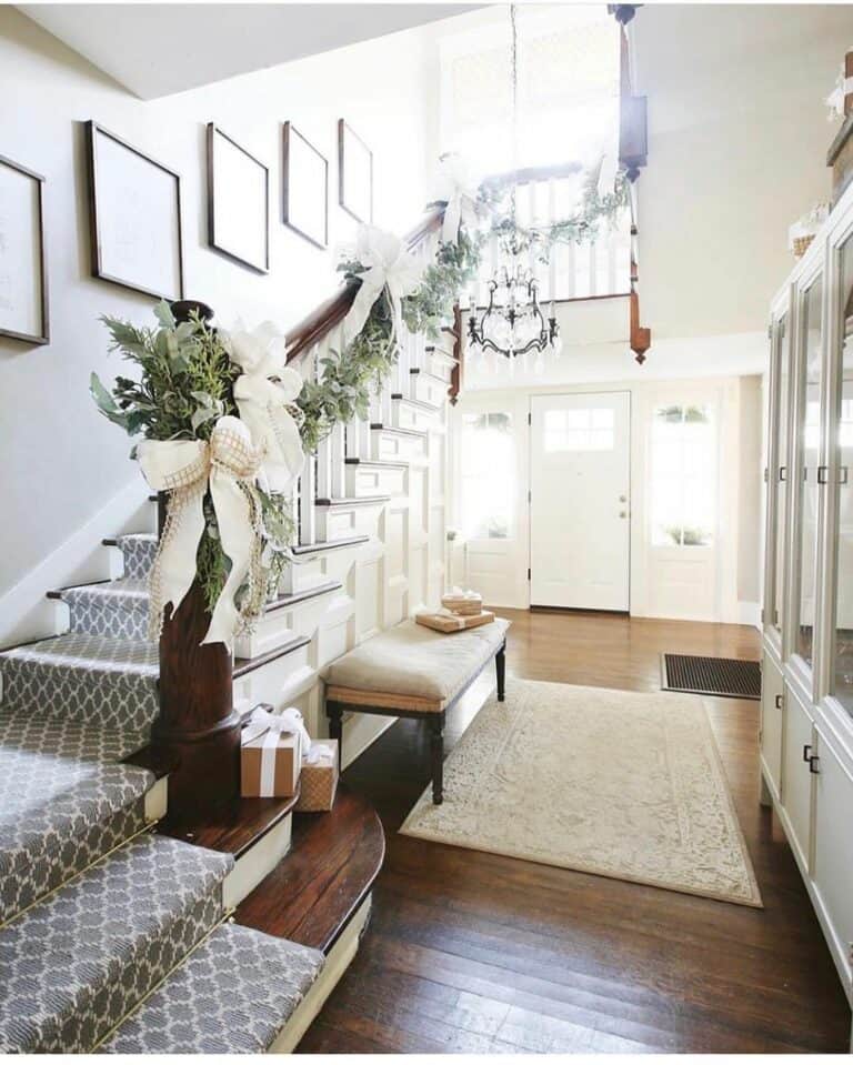 Hardwood and White Trimmed Staircase with Grey Runner
