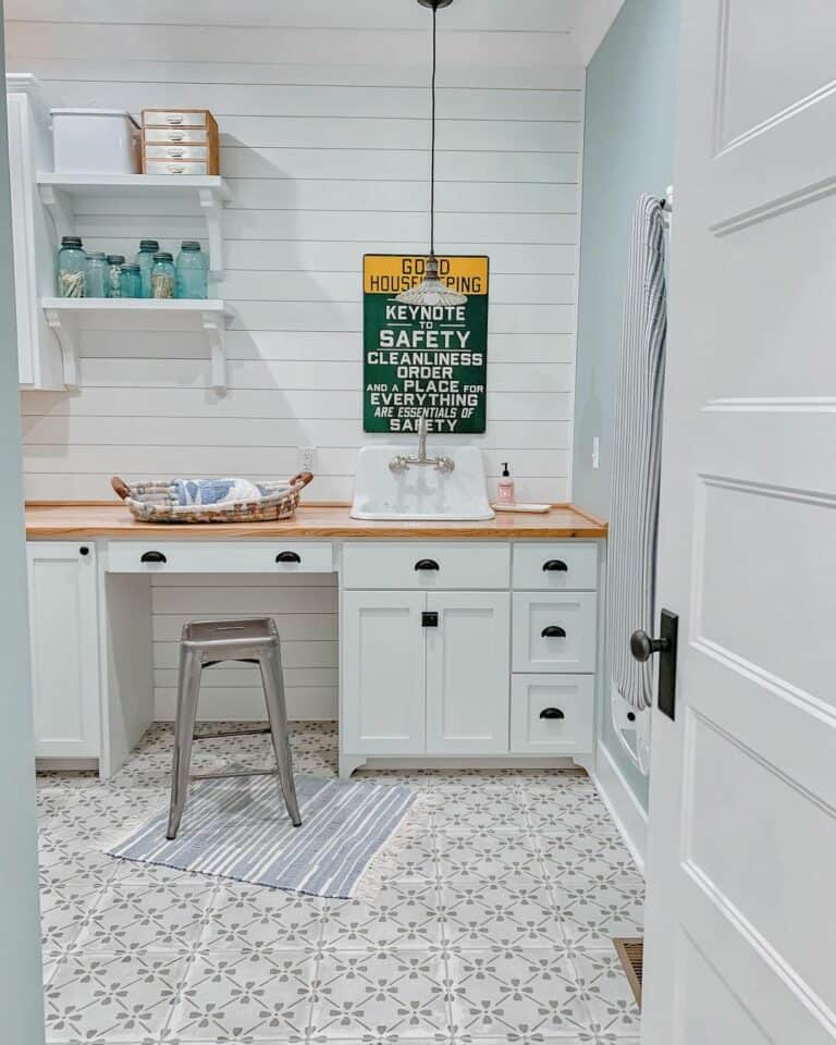 Light Blue Laundry Room with White Shiplap Accent Wall