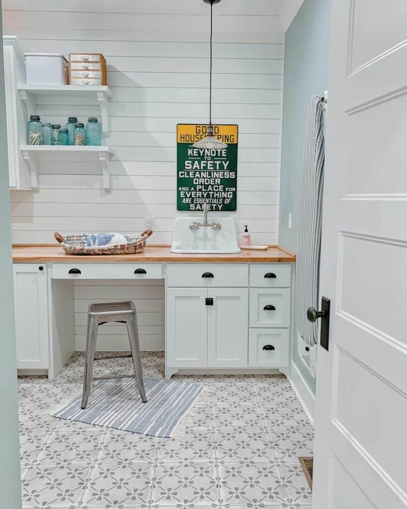 Light Blue Laundry Room with White Shiplap Accent Wall