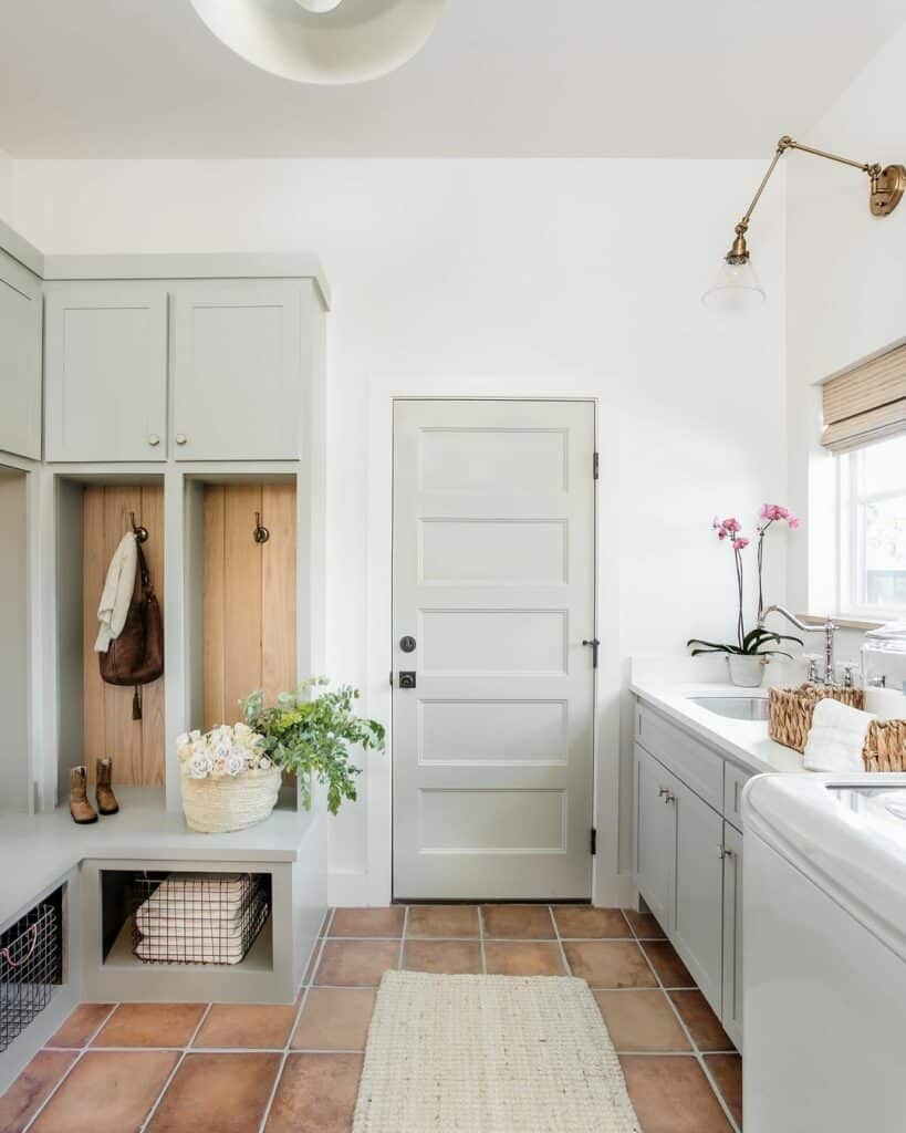 Light Gray Bench with Cubbies and Cabinets