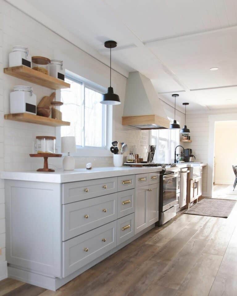 Light Grey Cabinets with Small Gold Knobs and Pulls