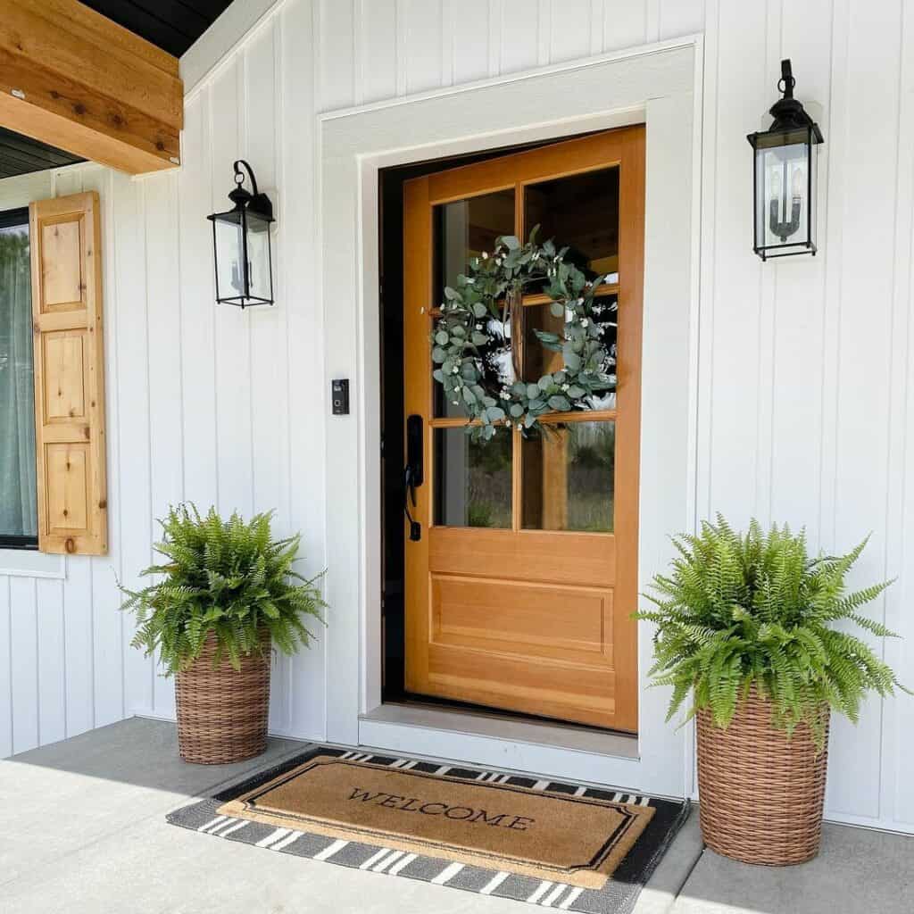 Light Wood Door with White Trim and Plant Décor