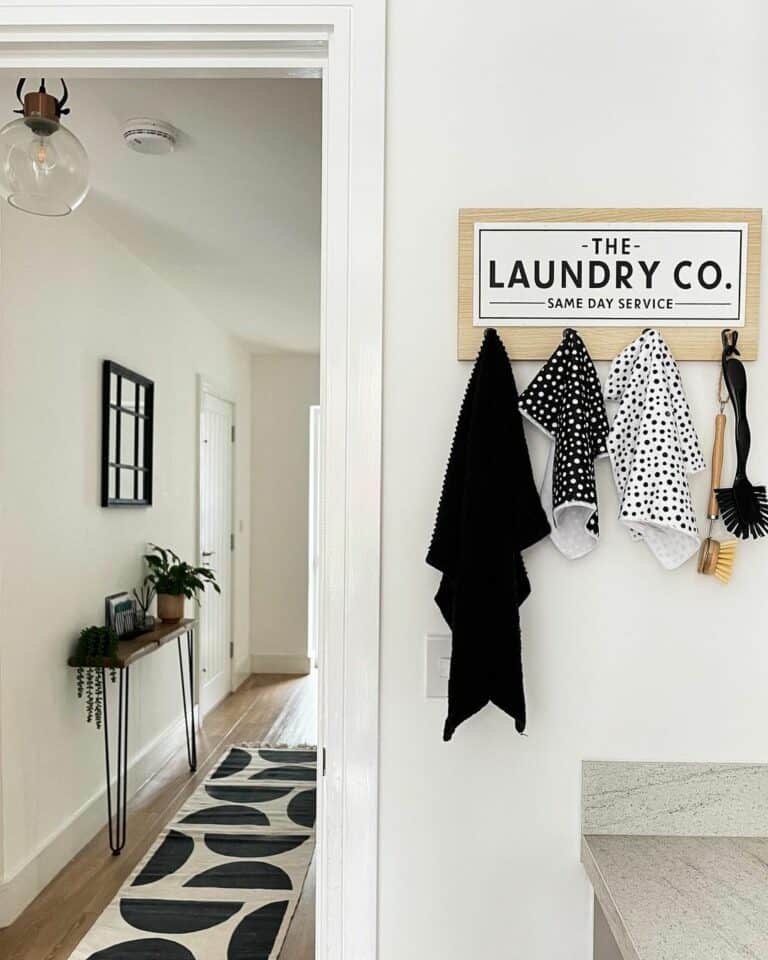 Light Wood Laundry Room Sign with Towel Hooks