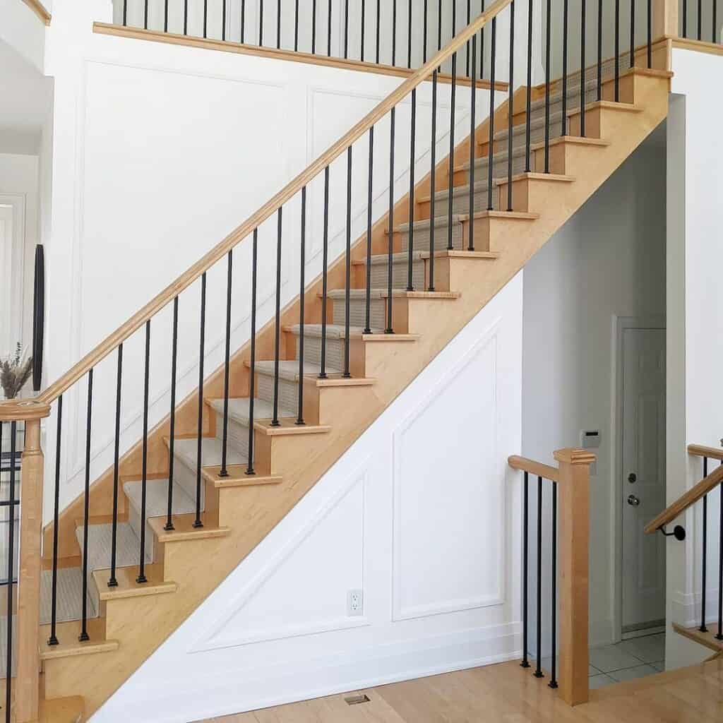 Light Wood Staircase and White Wall Panels