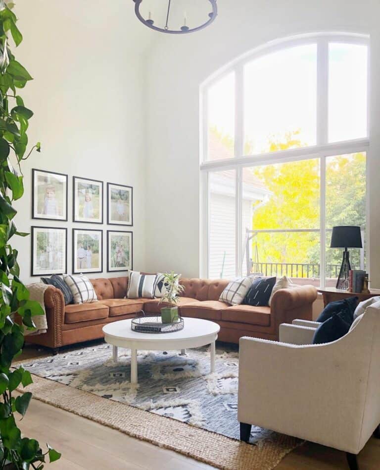 Living Room with Arched Windows and Gallery Wall