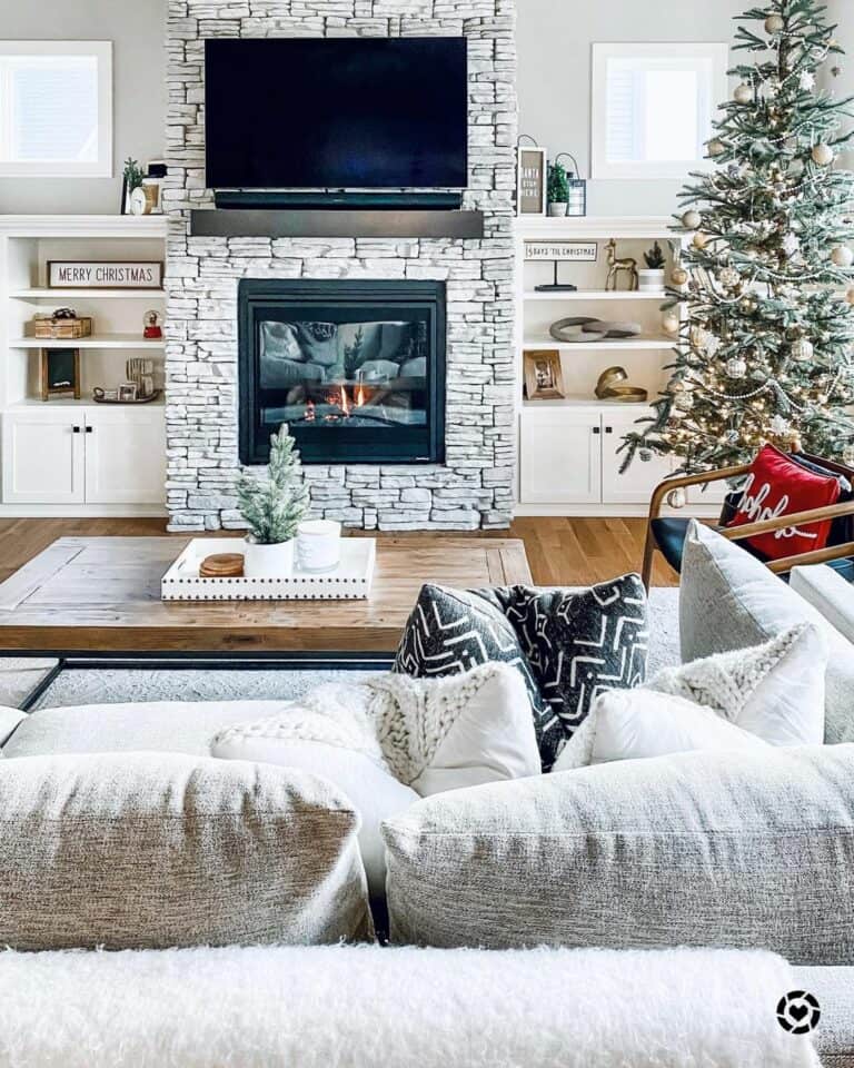 Living Room with Dry Stacked Stone Fireplace and Small Windows