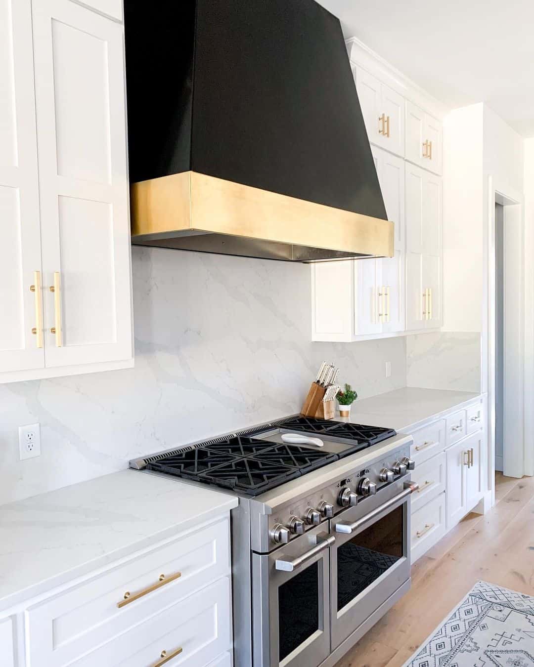 Marbled Backsplash Beneath Black Range Hood Soul & Lane