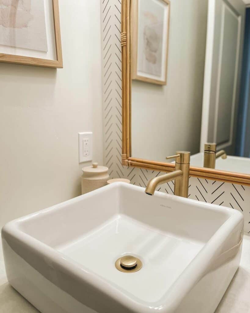 Minimalist Powder Room with Modern Gold Faucet