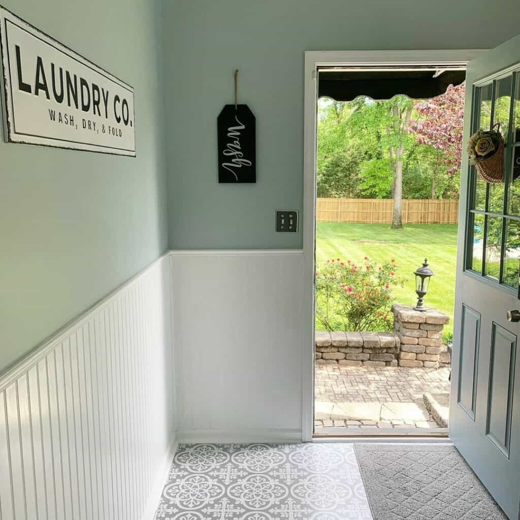 Mint-Colored Laundry Room with Delicate White Wainscoting