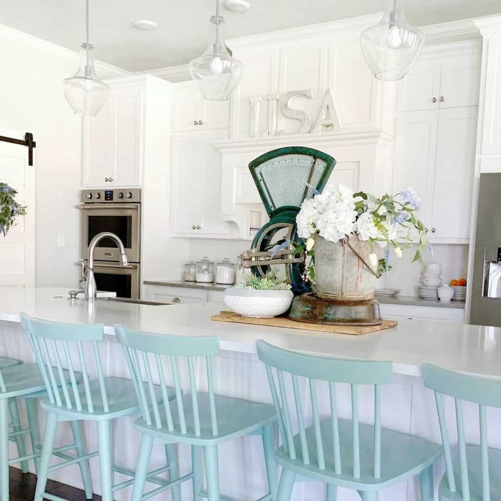 Mint Green Chairs In White Kitchen