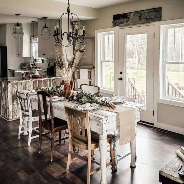 Mismatched Chairs With White Farmhouse Kitchen Table