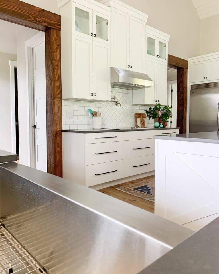 Modern Kitchen Cabinets Between Wood Door Frames