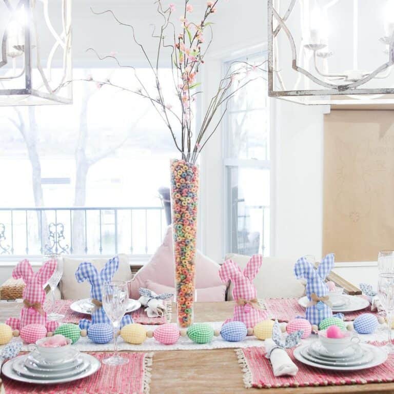 Pink and Blue Rabbits Next to Colorful Eggs