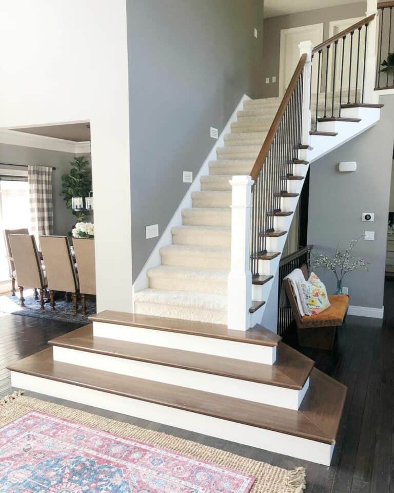 Platform Staircase and Layered Rugs