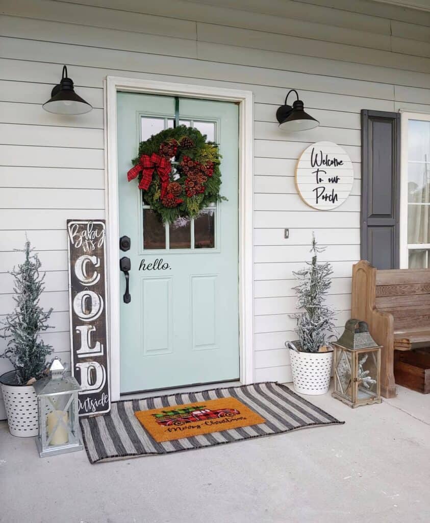 Porch with White Trim around Light Blue Door