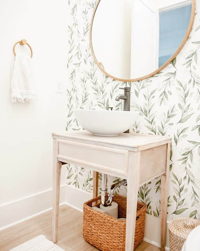 Powder Room with Soothing Green Leaf Patterned Wallpaper