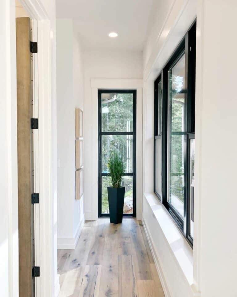 Recessed Lights in Hallway with Black Frame Windows