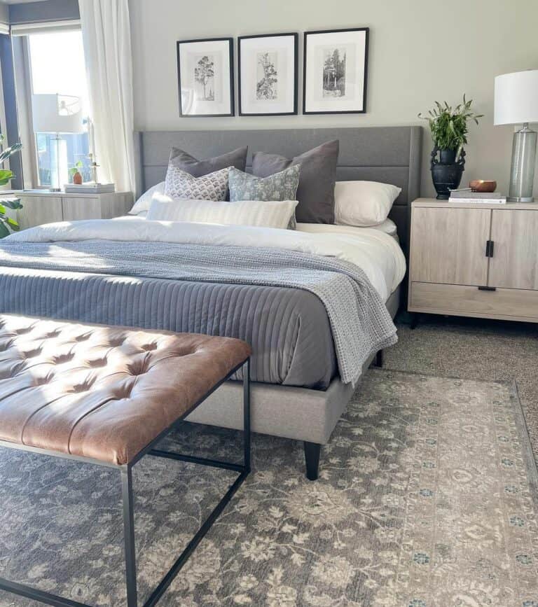 Room with Grey Pillows and Floral Area Rug