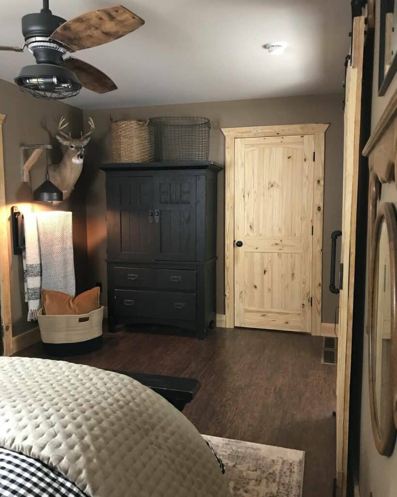 Rustic Natural Wood Door in Dark-Toned Bedroom