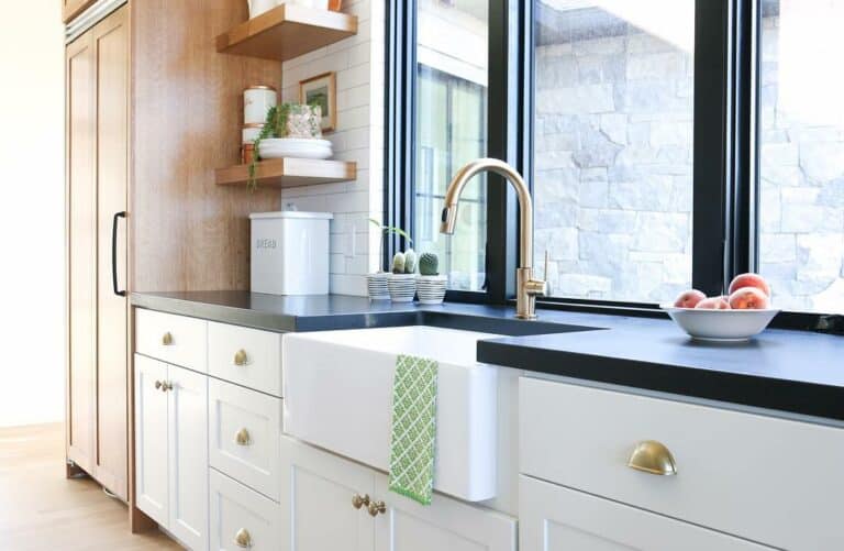 Small Floating Shelves Above Black Countertop