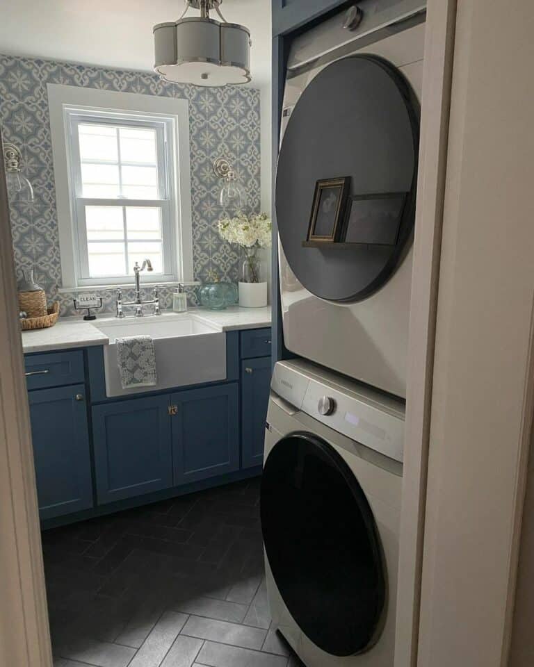Small Laundry Room Sink in Blue Cabinets