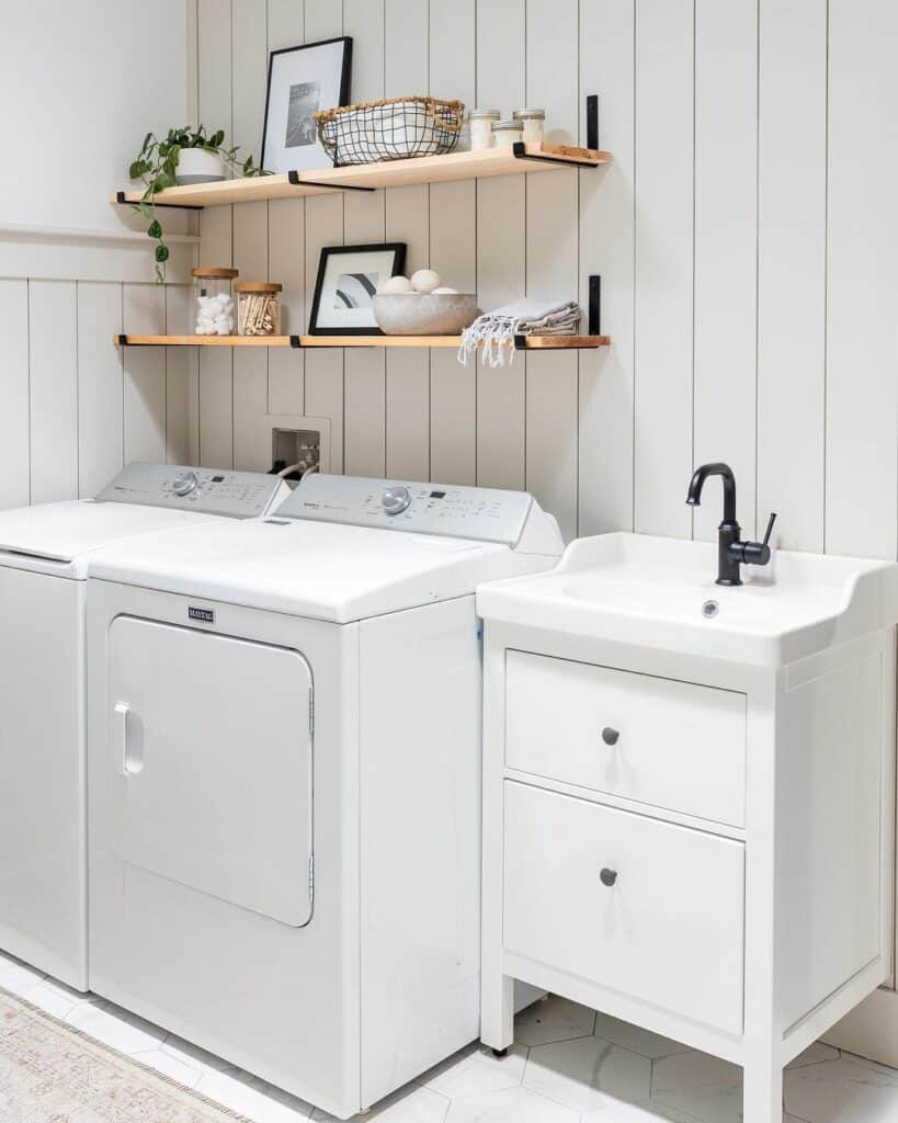 Small Sink Against Vertical Shiplap Wall