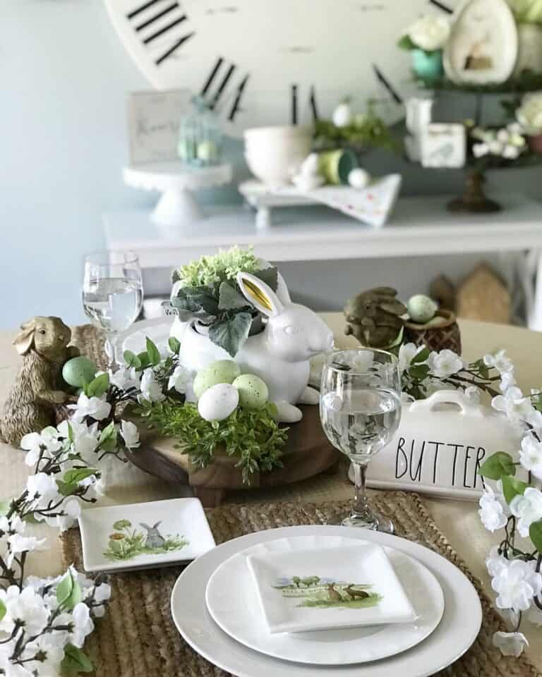 Spring Centerpiece With a White Rabbit and Pastel Eggs