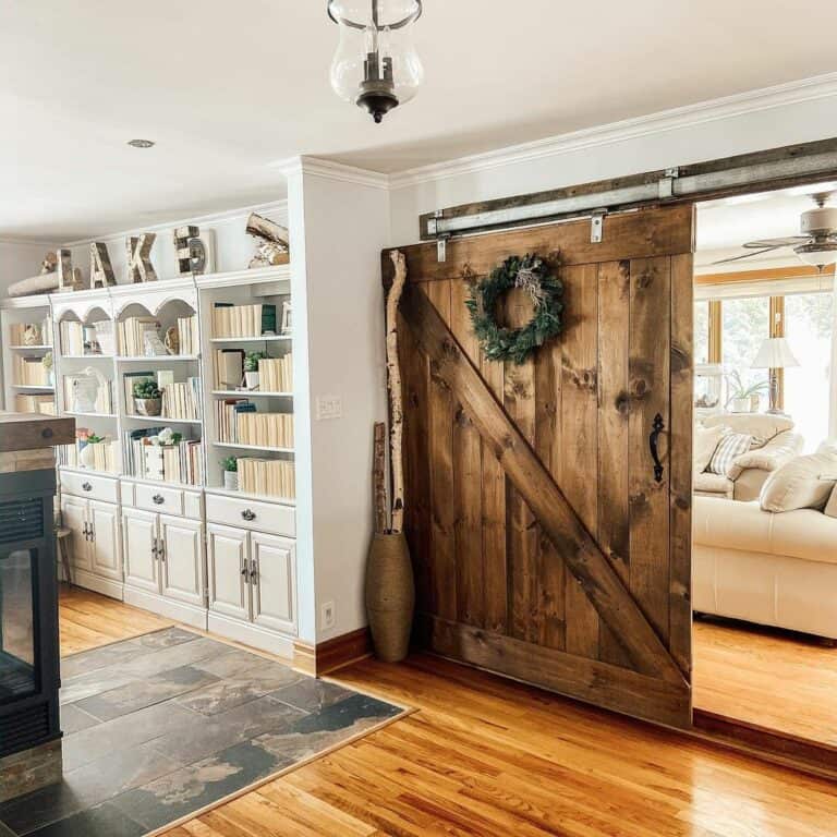 Stained Wood Wide Sliding Barn Door with Wreath