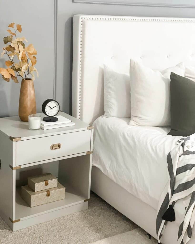 Studded White Headboard and Gray Bedroom Wall