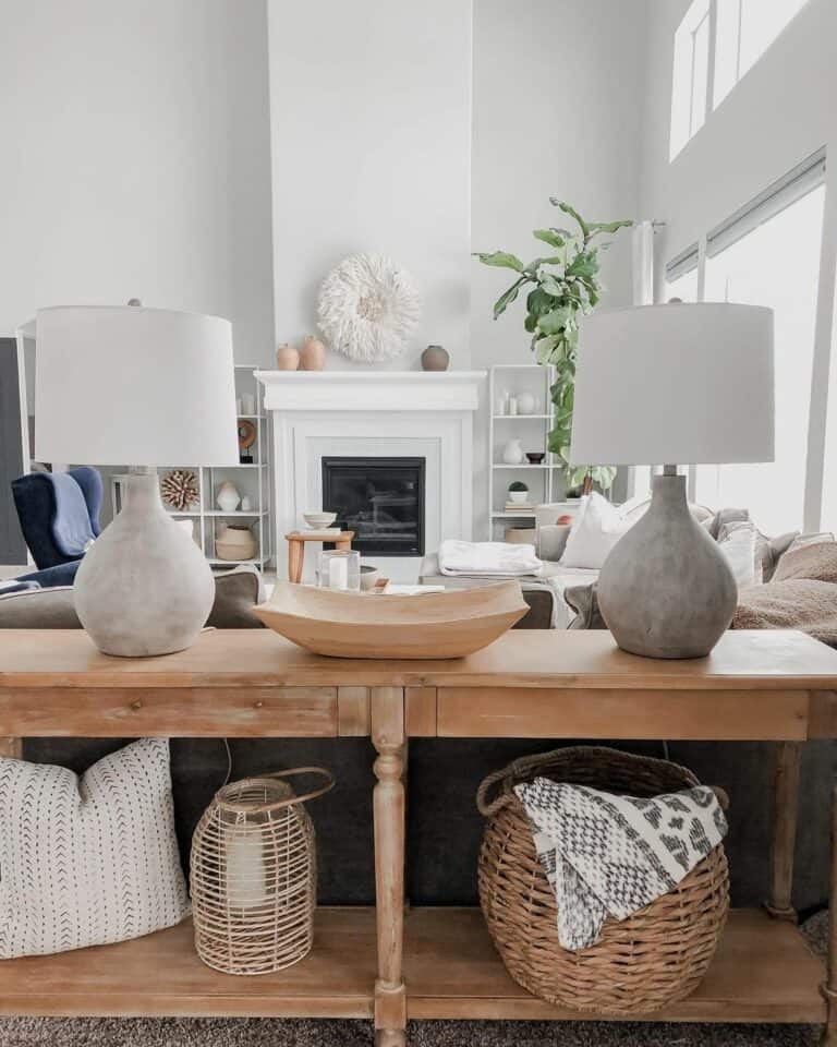 Tall Wall Art and Stone Lamps in Airy Living Room