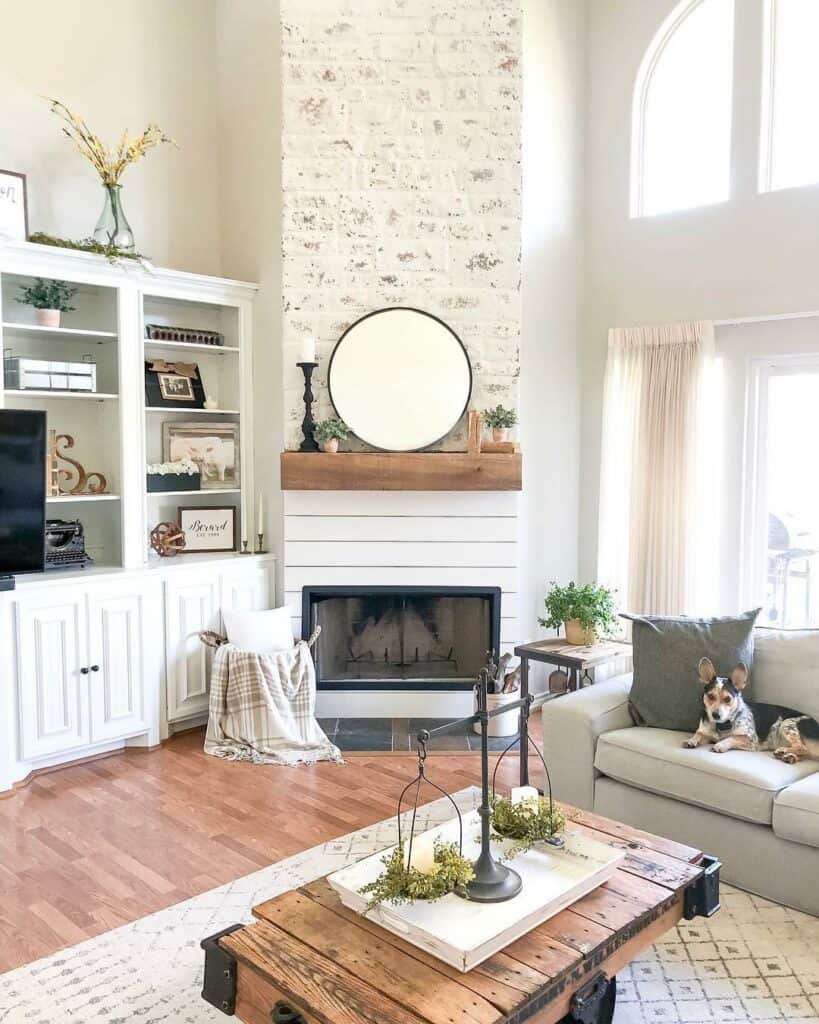 Tall Whitewashed Fireplace with Rustic Coffee Table