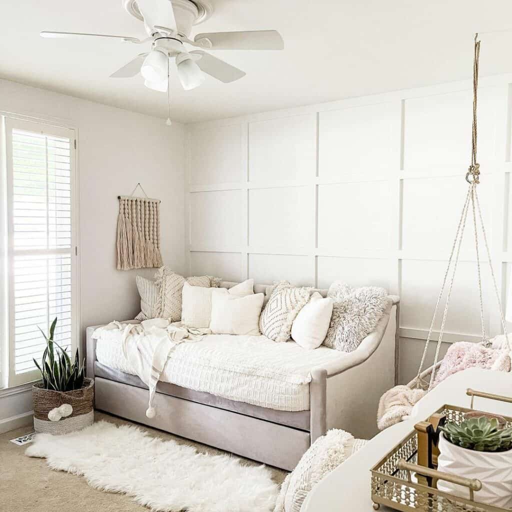 Textured White Bedroom with Suspended Seating