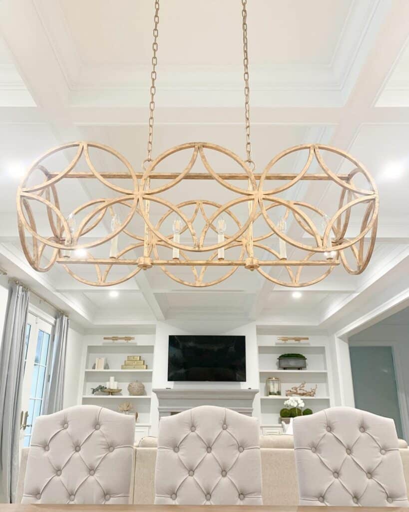 Unique Gold Chandelier on Box Beam Ceiling