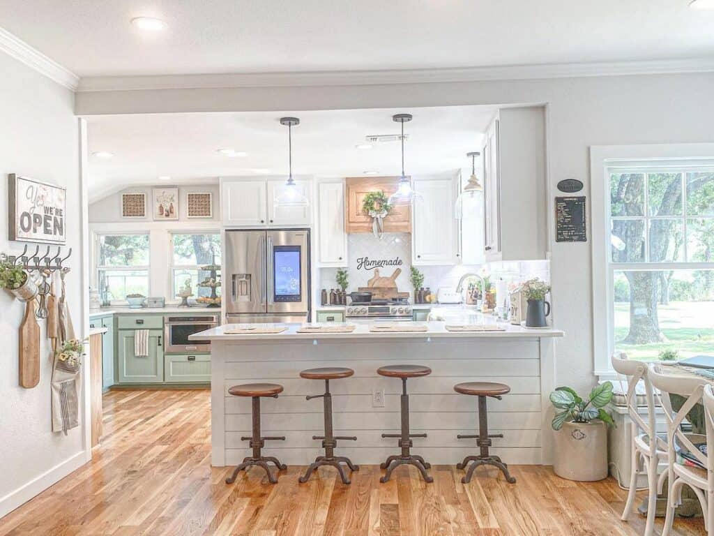 Varying Cabinet Colors in Farmhouse Kitchen