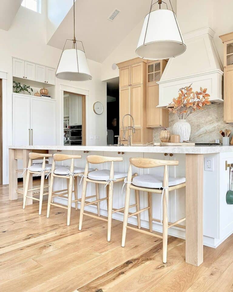 Vaulted Ceiling Kitchen with Natural Wood Stools