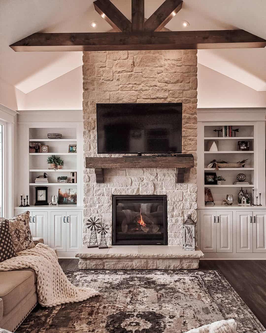 Vaulted Ceiling Living Room with Dark Wood Beam and Matching Mantel Soul & Lane